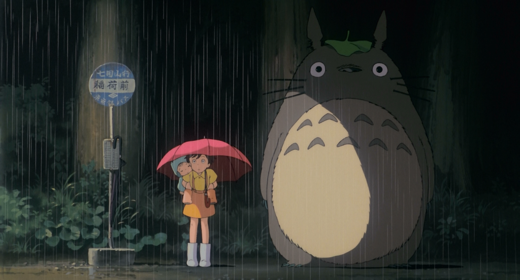 A cena em que Satsuki encontra Totoro na chuva é uma das mais famosas do cinema japonês (Foto: Reprodução)